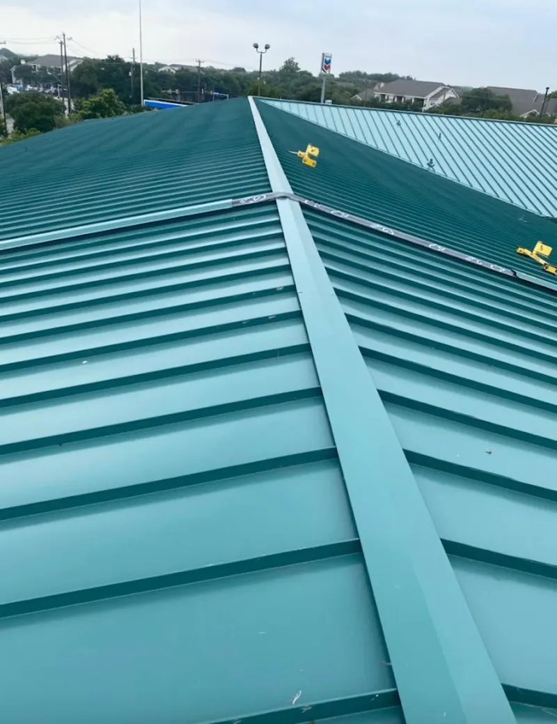 Green commercial metal roof ridge and valley for Metal Roof Repair in Milltown