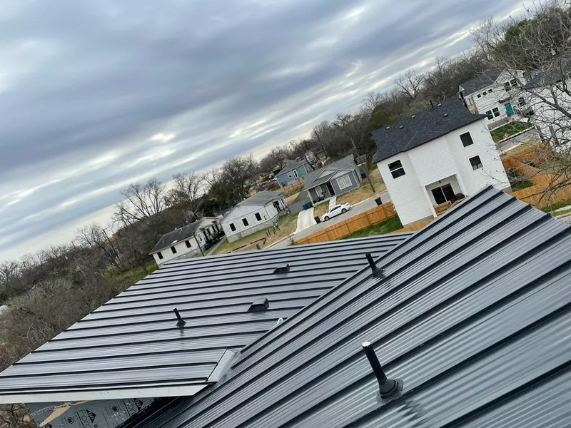 Standing seam metal roof panels with vents for Skylight Repair in Milltown